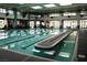 Indoor pool offers a year-round swimming option with well-lit lanes for exercise and recreation at 7669 Fieldfare Dr, North Las Vegas, NV 89084