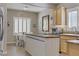 Bright kitchen area with a wood topped island, stainless steel appliances, and bright natural light at 7669 Fieldfare Dr, North Las Vegas, NV 89084