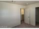 Bedroom featuring neutral walls, carpet and a door leading to a walk in closet at 7963 Laurena Ave, Las Vegas, NV 89147