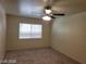 Bedroom featuring neutral walls, carpet, a window and ceiling fan at 7963 Laurena Ave, Las Vegas, NV 89147
