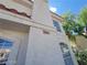 Close up of home's facade showing address number, windows, and textured exterior at 7963 Laurena Ave, Las Vegas, NV 89147