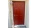 A close-up shot of the red front door at 7963 Laurena Ave, Las Vegas, NV 89147
