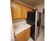 Spacious kitchen with wooden cabinets and stainless steel appliances at 7963 Laurena Ave, Las Vegas, NV 89147