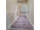 Carpeted staircase leading to the upper level, with white railings at 7963 Laurena Ave, Las Vegas, NV 89147