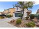 Charming two-story home with a two car garage, well maintained landscaping, and a traditional design at 8124 Loma Del Ray St, Las Vegas, NV 89131