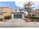 Charming two-story home with a two car garage, well maintained landscaping, and a traditional design at 8124 Loma Del Ray St, Las Vegas, NV 89131