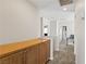 Upstairs hallway featuring a storage cabinet and carpet at 8124 Loma Del Ray St, Las Vegas, NV 89131