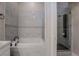 Bathroom featuring soaking tub and glass enclosed shower at 8169 Pinnacle Peak Ave, Las Vegas, NV 89113