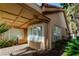 Exterior view with manicured landscaping and covered patio at 8169 Pinnacle Peak Ave, Las Vegas, NV 89113