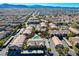 Extensive aerial view of neighborhood showing surrounding community at 8250 N Grand Canyon Dr # 2059, Las Vegas, NV 89166