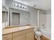 Bathroom features a vanity with a sink and a shower-tub combination at 8250 N Grand Canyon Dr # 2059, Las Vegas, NV 89166
