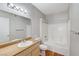 Bright bathroom with a combination bathtub and shower and single sink vanity at 8250 N Grand Canyon Dr # 2059, Las Vegas, NV 89166