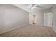 Generously sized bedroom featuring neutral walls, carpet and an ensuite bathroom at 8250 N Grand Canyon Dr # 2059, Las Vegas, NV 89166