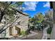 Beautiful courtyard area with sidewalk and a tranquil swimming pool at 8250 N Grand Canyon Dr # 2059, Las Vegas, NV 89166