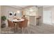Dining space with stylish decor, adjacent to the modern kitchen with updated appliances at 8250 N Grand Canyon Dr # 2059, Las Vegas, NV 89166