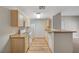 Well-equipped kitchen features white appliances, ample cabinetry, and a breakfast bar at 8250 N Grand Canyon Dr # 2059, Las Vegas, NV 89166