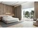Relaxing bedroom featuring wood accents, a large window view, and a calming, neutral color palette at 8825-1 S Monte Cristo Way, Las Vegas, NV 89113