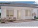 Inviting outdoor patio space with comfortable seating, modern lighting, and ample room for relaxing at 8825-1 S Monte Cristo Way, Las Vegas, NV 89113