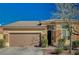 Charming single-story home with a two-car garage and well-maintained desert landscaping at 8856 Timber Mesa St, Las Vegas, NV 89139