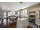 Bright, open kitchen with stainless appliances and dining area at 8856 Timber Mesa St, Las Vegas, NV 89139