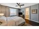 Main bedroom view features a ceiling fan and a large window at 8856 Timber Mesa St, Las Vegas, NV 89139