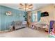 Bright and airy bedroom with a ceiling fan and plenty of natural light at 9413 Ironsend St, Las Vegas, NV 89143