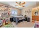 This bedroom is well-lit with lots of shelves, storage and large windows at 9413 Ironsend St, Las Vegas, NV 89143