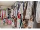 Walk in closet with ample hanging space and storage for organization at 9413 Ironsend St, Las Vegas, NV 89143