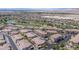 Picture of a residential area with a golf course and desert landscape at 1040 Via Panfilo Ave, Henderson, NV 89011