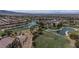 Aerial view showcasing the verdant golf course and surrounding community at 1040 Via Panfilo Ave, Henderson, NV 89011