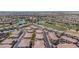 Residential area featuring well maintained homes and a golf course with water feature at 1040 Via Panfilo Ave, Henderson, NV 89011