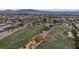Aerial view of community golf course with lush green grass at 1040 Via Panfilo Ave, Henderson, NV 89011