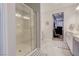 Beautiful bathroom showcasing a glass-enclosed shower and contemporary design elements at 1040 Via Panfilo Ave, Henderson, NV 89011