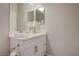 Clean bathroom with a modern vanity, featuring ample counter space and storage at 1040 Via Panfilo Ave, Henderson, NV 89011