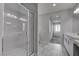 Modern bathroom featuring glass shower and updated fixtures at 1040 Via Panfilo Ave, Henderson, NV 89011