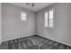 Bedroom with white shutters, neutral walls, and carpet, creating a comfortable and well-lit atmosphere at 1040 Via Panfilo Ave, Henderson, NV 89011