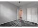 Bedroom offering a spacious layout, closet with sliding doors, and neutral carpeting for comfort and versatility at 1040 Via Panfilo Ave, Henderson, NV 89011