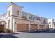 Charming townhome featuring a private two-car garage and well-maintained stucco exterior in a desirable community at 1040 Via Panfilo Ave, Henderson, NV 89011