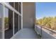 Private balcony with railing offering neighborhood views and access to natural light at 11441 Allerton Park Dr # 217, Las Vegas, NV 89135