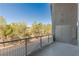 Balcony view showcasing neighborhood greenery and outdoor living space at 11441 Allerton Park Dr # 217, Las Vegas, NV 89135