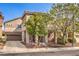Inviting two-story home featuring a landscaped front yard and attached garage at 1332 Cedar Berry Ct, Henderson, NV 89012