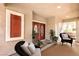 Inviting front porch with seating and a double door entry at 1332 Cedar Berry Ct, Henderson, NV 89012