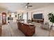 Open living room with neutral colors, large windows, dining area and modern decor at 1332 Cedar Berry Ct, Henderson, NV 89012