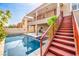 Stunning pool view from the upper-level deck featuring a beautiful backyard oasis at 1332 Cedar Berry Ct, Henderson, NV 89012