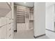 A walk-in closet with custom shelving and drawers, providing ample storage and organization at 14 Heron Harbour Dr, Henderson, NV 89011