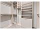 Spacious walk-in closet featuring custom shelving, hanging rods, and ample storage space at 14 Heron Harbour Dr, Henderson, NV 89011