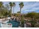 An aerial view of the backyard pool featuring a rock waterfall at 1404 Colony Pine St, Las Vegas, NV 89144