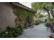 Charming home exterior featuring a water feature and lush landscaping at 1404 Colony Pine St, Las Vegas, NV 89144