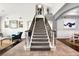 Grand foyer with a staircase and views into the formal dining room and living room at 1404 Colony Pine St, Las Vegas, NV 89144