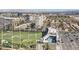 Overhead view of a property showcasing a lush golf area and a sparkling swimming pool at 145 E Harmon Ave # 2008, Las Vegas, NV 89109